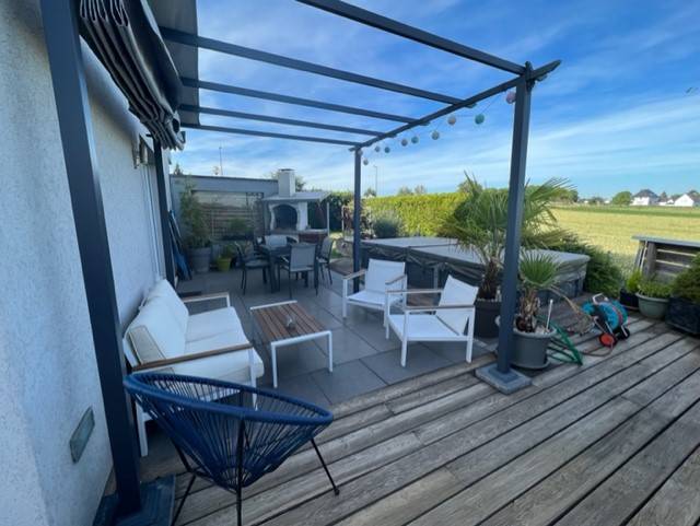 Maison avec terrasses bien exposés